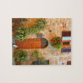 Eine Katze sucht Eintritt in die Zuhause in Pienza Puzzle (Horizontal)