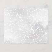 Eine kleine Schneeflocke ist auf dem Weg zur Graue (Rückseite)