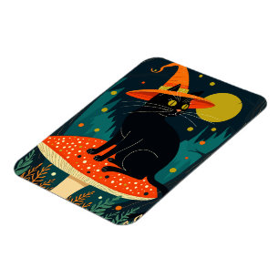 Eine kleine schwarze Hexenkatze sitzt auf einem Gi Magnet