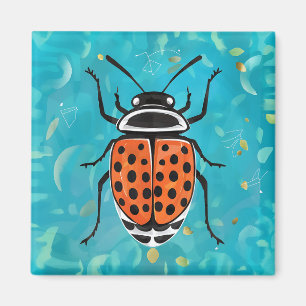 Eine Ladybude mit schwarzen Flecken und orangen St Magnet