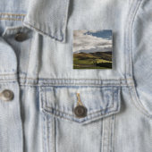 Eine Landschaft mit Rolling Hills und Wolken Button (Beispiel)