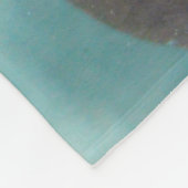 Eine niedliche Brown-Otterschwimmen in einem Fleecedecke (Ecke)