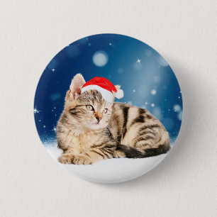 Eine Niedliche Katze, die einen Weihnachtsschnee i Button