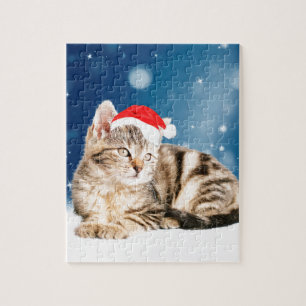 Eine Niedliche Katze, die einen Weihnachtsschnee i Puzzle