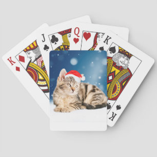 Eine Niedliche Katze, die einen Weihnachtsschnee i Spielkarten