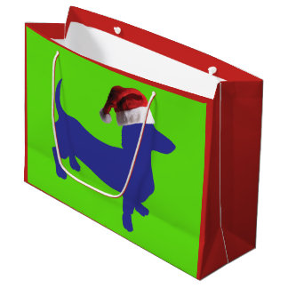 Eine Niedliche Lila Dackel mit einem Weihnachtshut Große Geschenktüte