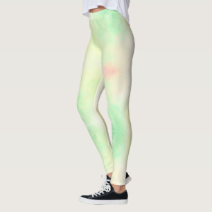 Eine Person, die pastellgrüne Leggings mit rosa tr