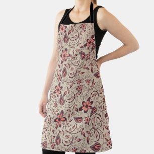 Eine Person trägt eine Schürze mit Blumenmuster