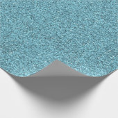 Eine Rolle blaues Geschenkpapier mit einer texturi (Ecke)
