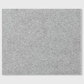 Eine Rolle graues Geschenkpapier mit glitzerndem T (Flach)