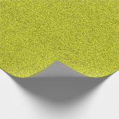 Eine Rolle grünes texturiertes Geschenkpapier (Ecke)