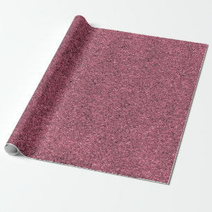 Eine Rolle rosa und schwarz gesprenkeltes Geschenk Geschenkpapier