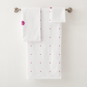 Eine rosa Blume mit schwarzen Flecken auf den Blät Badhandtuch Set