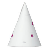 Eine rosa Blume mit schwarzen Flecken auf den Blät Partyhütchen (Links)