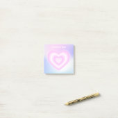 Eine rosa neonale Herzform Post-it Klebezettel (Auf Schreibtisch)