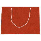 Eine rote glitzernde Papiertüte Große Geschenktüte (Vorderseite)