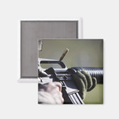 Eine Rundfliege aus der Kammer eines M-16A2 Magnet (Vorderseite/Rückseite)