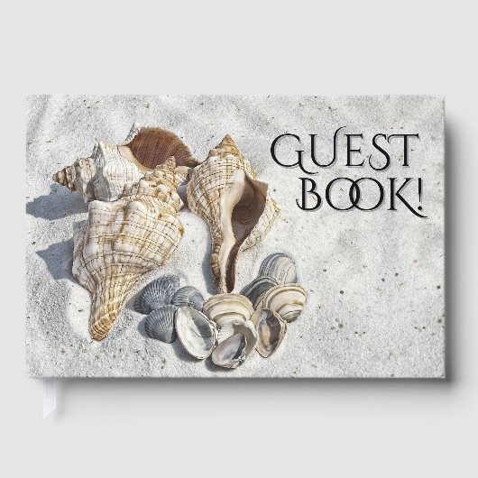 Eine Sammlung von Muscheln im Sand Gästebuch (Vorderseite)