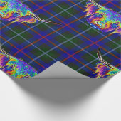 Eine schöne bunte Hochlandkuh auf Tartan. Geschenkpapier (Ecke)