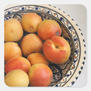 Eine Schüssel mit Aprikosen/Marillen aus dem Mitte Quadratischer Aufkleber