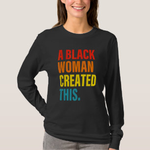 Eine Schwarze Frau hat diese Bekleidung geschaffen T-Shirt