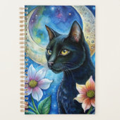 Eine schwarze Katze mit auffälligen gelben Augen Planer (Vorderseite)