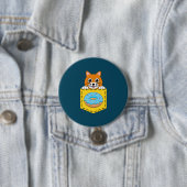 Eine spähende Katze und ein blauer Donut Button (Beispiel)