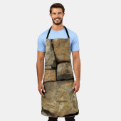 Eine Steinmauer aus Kopfsteinpflaster-Hintergrund Schürze (Getragen)