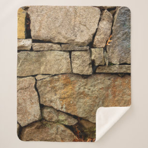 Eine Steinmauer aus Kopfsteinpflaster-Hintergrund Sherpadecke