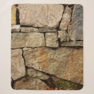 Eine Steinmauer aus Kopfsteinpflaster Hintergrundt Sherpadecke