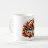 Eine Tabelle mit dem klassischen T - Shirt der Dan Kaffeetasse (Vorderseite Links)