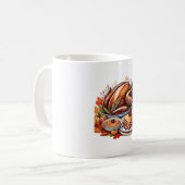 Eine Tabelle mit dem klassischen T - Shirt der Dan Kaffeetasse (Vorderseite Links)