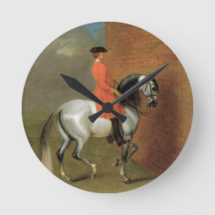 Eine Übung in Haute Ecole: Der Durchgang zum Lef Runde Wanduhr