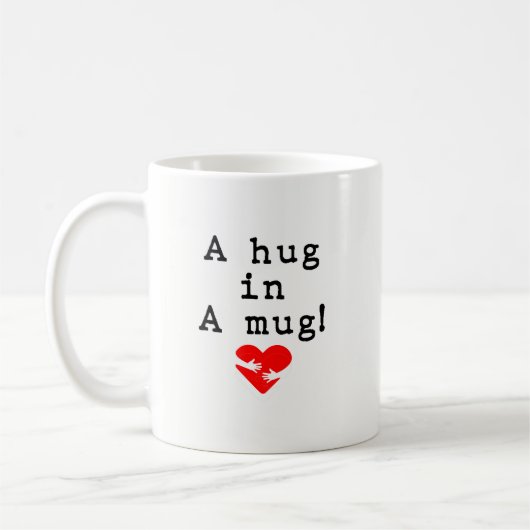 Eine Umarmung in einer Tasse! Kaffeetasse (Links)