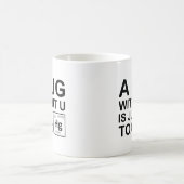 Eine Umarmung ohne U ist nur giftig Kaffeetasse (Mittel)