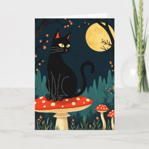 Eine vertraute schwarze Katze und Halloweentrichte Feiertagskarte