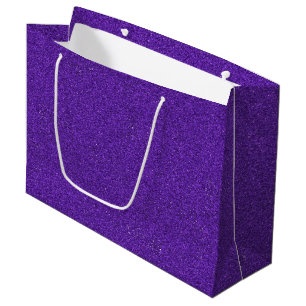 Eine violette glitzernde Geschentüte mit weißen Gr Große Geschenktüte
