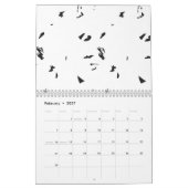 Eine Vogelherde, die am Himmel fliegt. Kalender (Feb 2027)