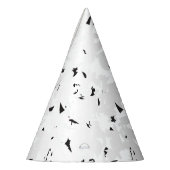 Eine Vogelherde, die am Himmel fliegt. Partyhütchen (Links)