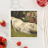 Eine weiße persische Katze, die einen Ladybug guck Serviette (Beispiel)