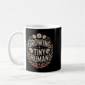 Eine winzige Announc der menschlichen Junge Mutter Kaffeetasse (Links)