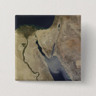 Eine Wolke des tan Staubes von Saudi-Arabien Button