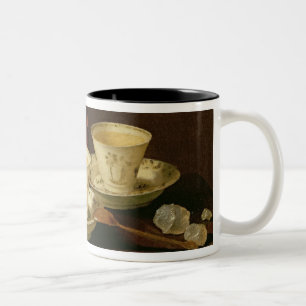 Eine Yixing-Teekanne und ein chinesisches Zweifarbige Tasse