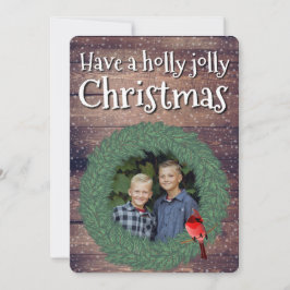 Einen Holly-Jolly-Weihnachtskranz im Foto haben Feiertagskarte