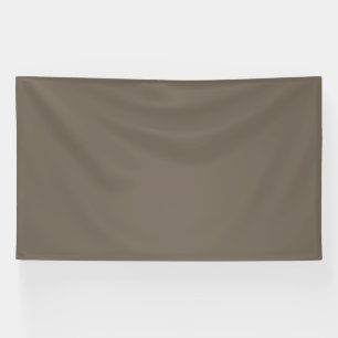 Einen stilvollen Wohnraum mit brauner Wand schaffe Banner