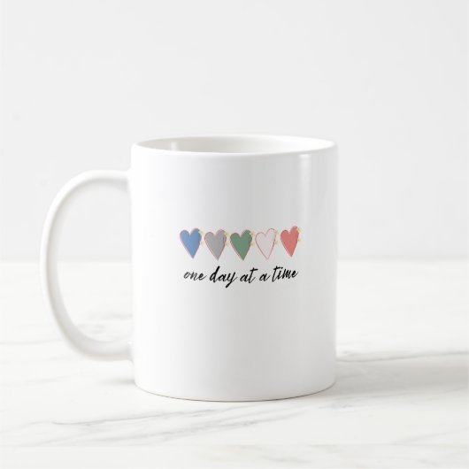 einen Tag nach dem anderen Kaffeetasse (Links)