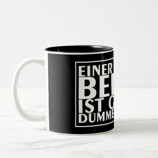 Einer von uns vor dem Europäischen Parlament Zweifarbige Tasse (Links)