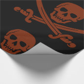 Einfach lächelnder Piratenschädel mit überquerten Geschenkpapier (Ecke)