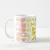 Einfache geometrische Formen in der Pastellkoralle Kaffeetasse (Links)