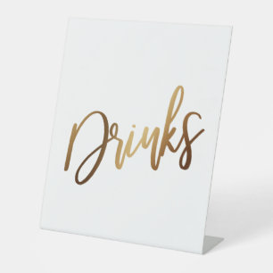 Einfache Gold Handschrift Typografie "Drinks" Sockelschild